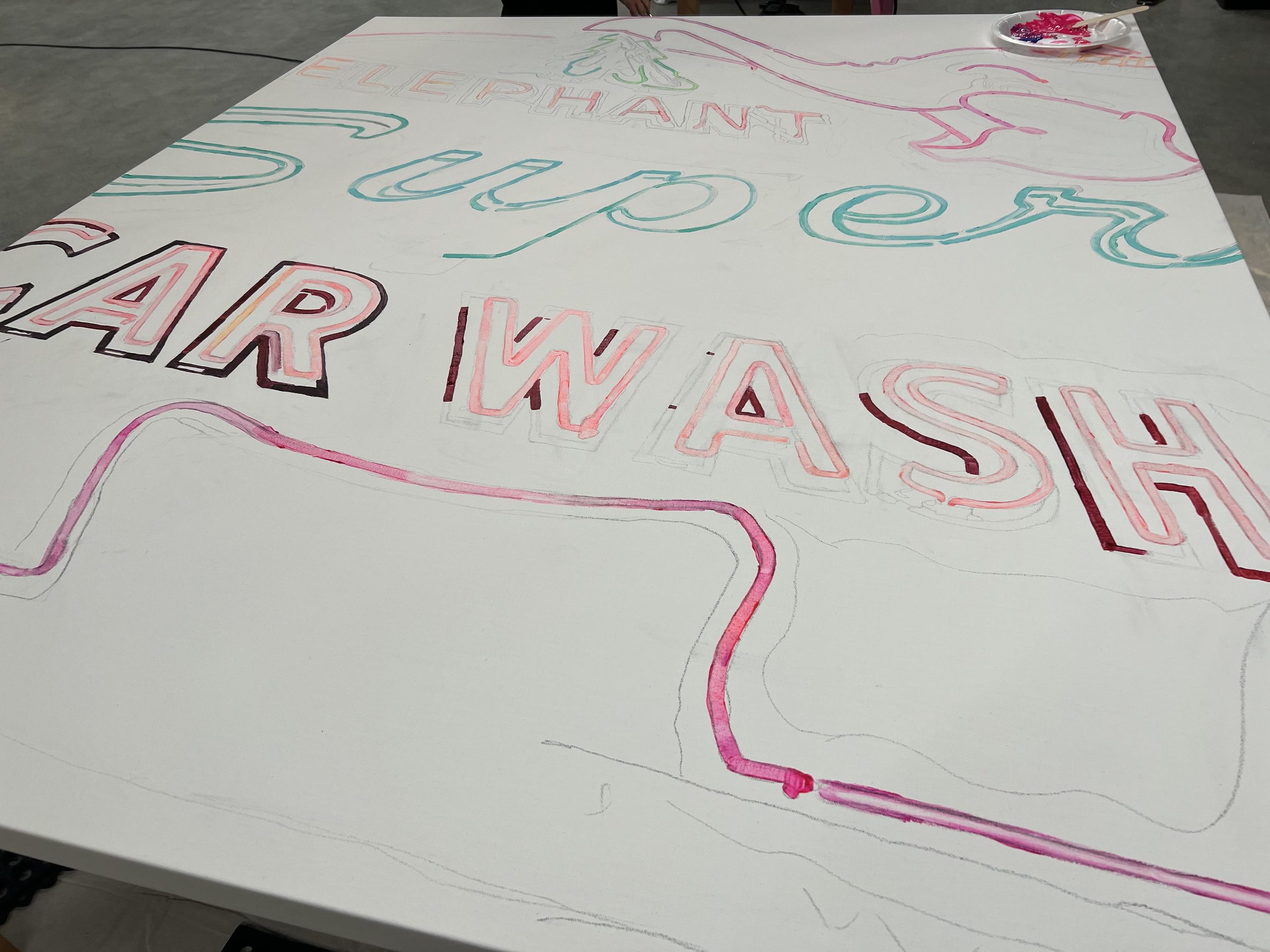 First chalked outlines of the CAR WASH lettering laid across a raw canvas.